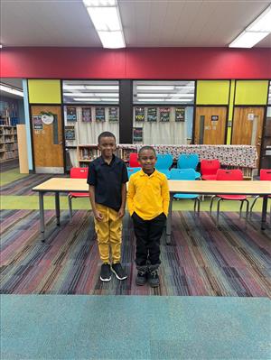 2 boys standing